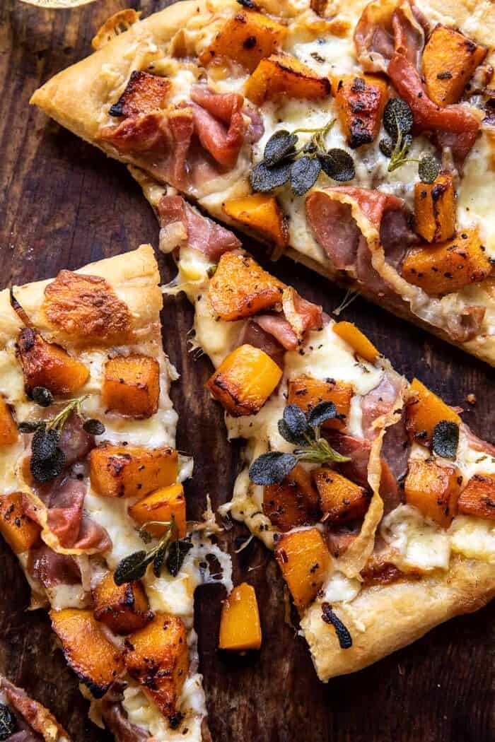 overhead close up photo of Roasted Butternut Squash Prosciutto Pizza with Caramelized Onions