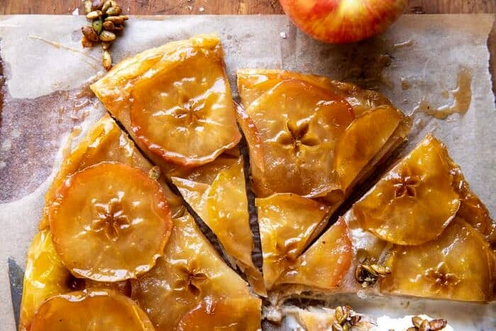 Salted Maple Apple Tarte Tatin with Cinnamon Pumpkin Seeds | halfbakedharvest.com overhead horizontal photo of Salted Maple Apple Tarte Tatin with Cinnamon Pumpkin Seeds
