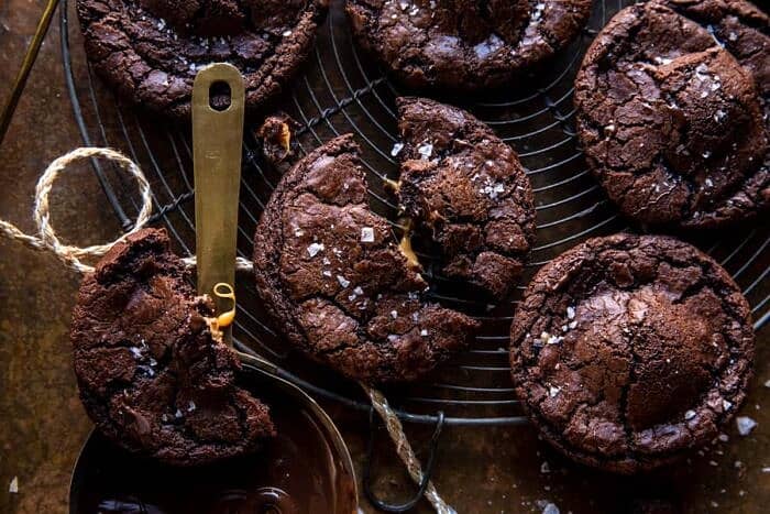 Crinkly Caramel Stuffed Brownie Cookies | halfbakedharvest.com overhead horizontal photo of Crinkly Caramel Stuffed Brownie Cookies