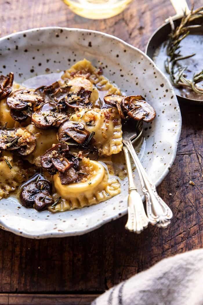 side angled photo of Rosemary Butter Mushroom and Cheese Ravioli 