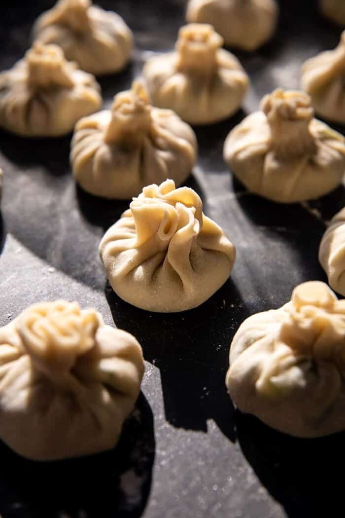 Sesame Chicken Dumplings in Spicy Broth with Garlic Crisps | halfbakedharvest.com prep photo of Sesame Chicken Dumplings before cooking