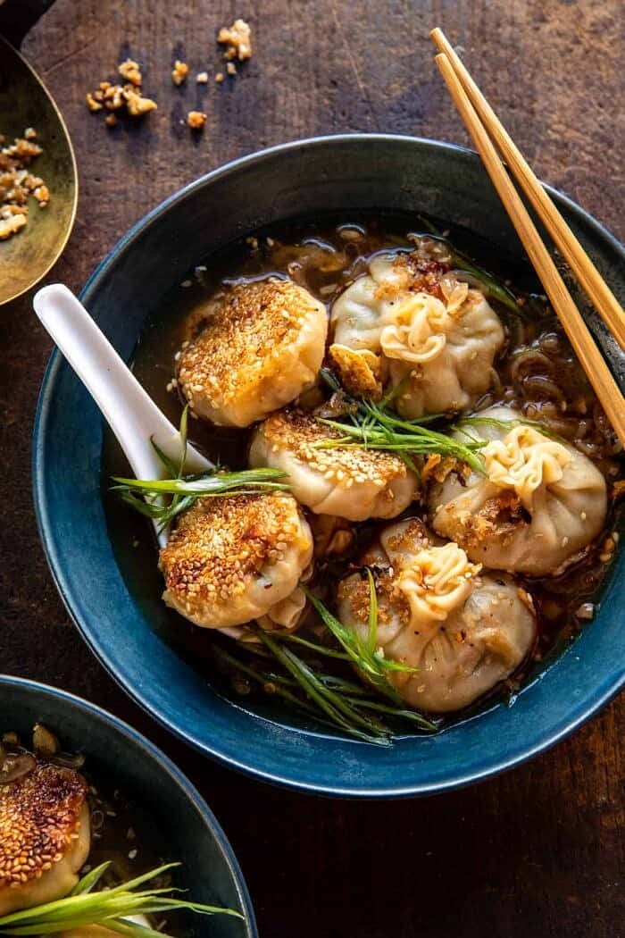 Sesame Chicken Dumplings in Spicy Broth with Garlic Crisps | halfbakedharvest.com overhead photo of Sesame Chicken Dumplings in Spicy Broth with Garlic Crisps