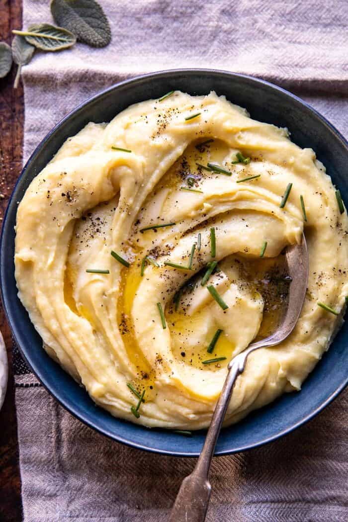Slow Cooker Cheesy Garlic Herb Mashed Potatoes | halfbakedharvest.com
