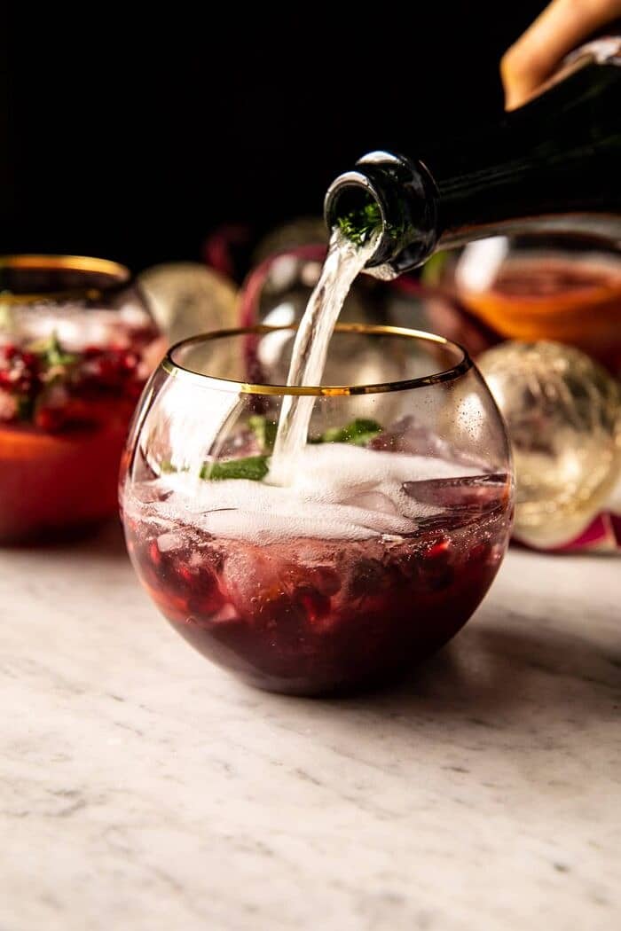 Citrus Pomegranate Champagne Twist | halfbakedharvest.com prep photo of Citrus Pomegranate Champagne Twist