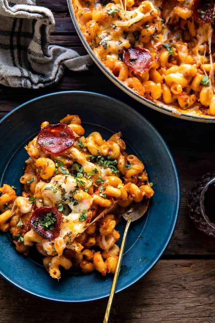 One Pot Spicy Alla Vodka Pizza Pasta | halfbakedharvest.com One Pot Spicy Alla Vodka Pizza Pasta on serving plate with fork