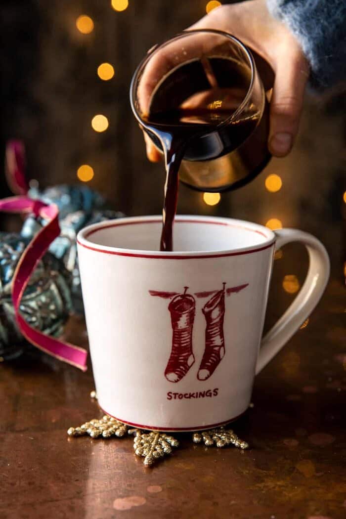 Salted Caramel Brulee Latte | halfbakedharvest.com prep photo of pouring espresso