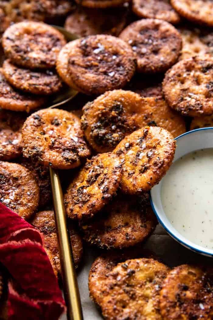 Sweet and Spicy Seasoned Crackers | halfbakedharvest.com side angle photo of Sweet and Spicy Seasoned Crackers