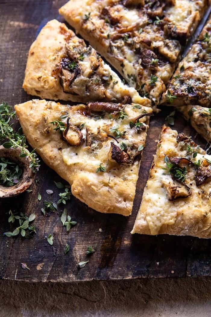 Balsamic Mushroom Fontina Pizza | halfbakedharvest.com side angled close up photo of Balsamic Mushroom Fontina Pizza