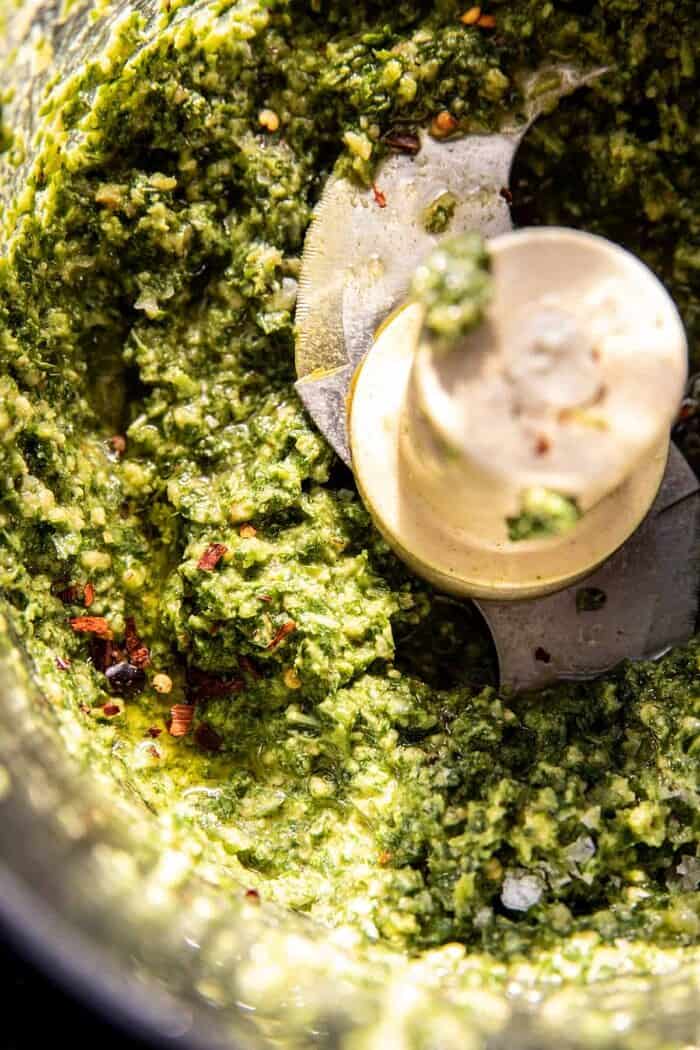 Crispy Roasted Cauliflower with Creamy Pesto Pasta | halfbakedharvest.com prep photo of pesto in food processor