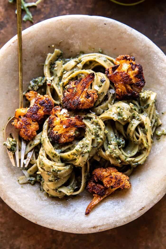 Crispy Roasted Cauliflower with Creamy Pesto Pasta | halfbakedharvest.com overhead close up photo of Crispy Roasted Cauliflower with Creamy Pesto Pasta