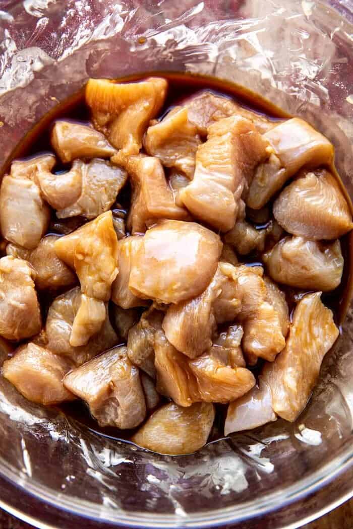 Healthier 25 Minute Kung Pao Chicken | halfbakedharvest.com prep photo of chicken marinating