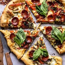 Pesto Pizza with Feta Stuffed Crust | halfbakedharvest.com