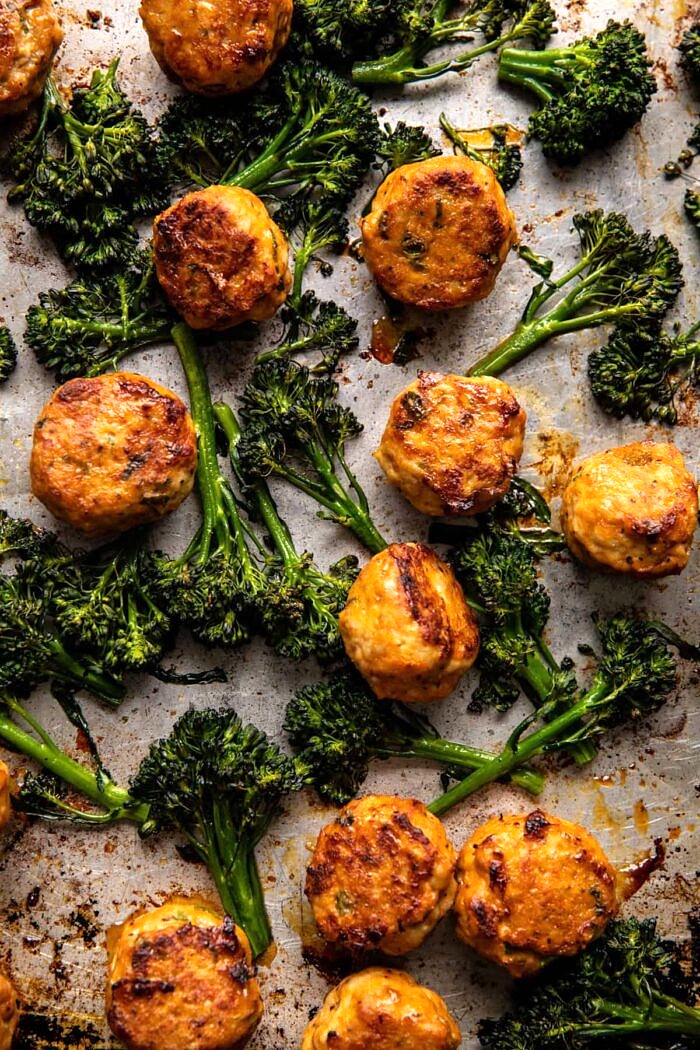 Sheet Pan Sticky Korean Chicken Meatballs | halfbakedharvest.com meatballs and broccoli after baking