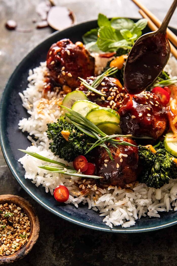 Sheet Pan Sticky Korean Chicken Meatballs | halfbakedharvest.com Sheet Pan Sticky Korean Chicken Meatballs with sauce drizzle