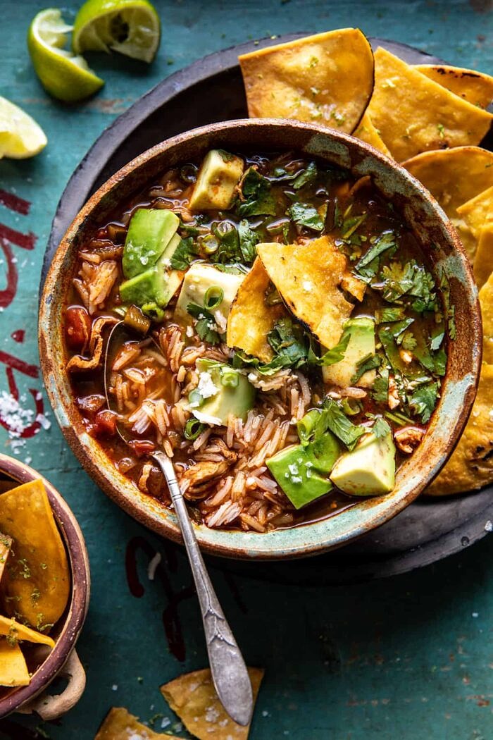 Slow Cooker Chipotle Chicken and Avocado Rice Soup | halfbakedharvest.com overhead photo of Slow Cooker Chipotle Chicken and Avocado Rice Soup