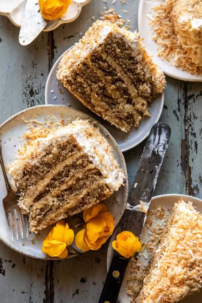overhead photo of Coconut Pecan Caramel Butter Cake slices on plates
