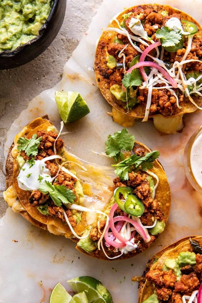 Cool Ranch Chicken Tostadadillas with Honey Lime Crema | halfbakedharvest.com overhead photo of Cool Ranch Chicken Tostadadillas pulled apart to see the cheese