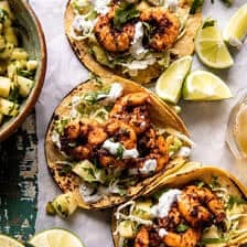 Sheet Pan Jalapeño Pineapple Shrimp Tacos with Cilantro Garlic Sauce | halfbakedharvest.com