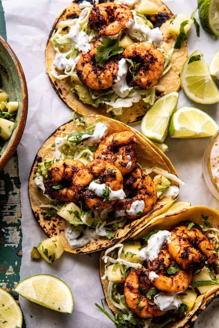 Sheet Pan Jalapeño Pineapple Shrimp Tacos with Cilantro Garlic Sauce | halfbakedharvest.com