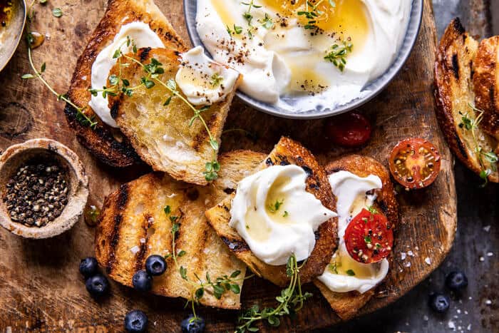 Whipped Ricotta Toast with Marinated Tomatoes and Lemon Thyme Honey | halfbakedharvest.com