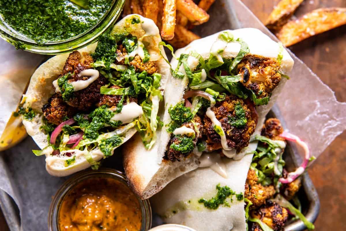 Roasted Cauliflower Pitas with Zhug and Garlic Tahini | halfbakedharvest.com