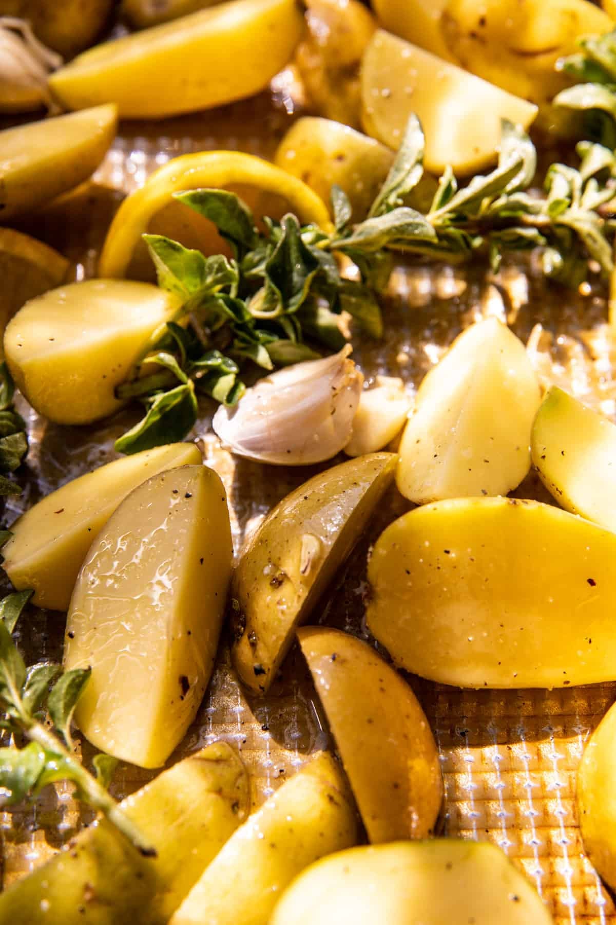 potatoes on baking sheet before roasting 