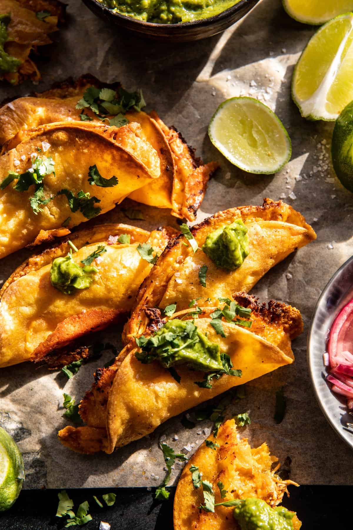 Crockpot Crispy Chicken Tinga Tacos with Avocado Jalapeño Crema | halfbakedharvest.com