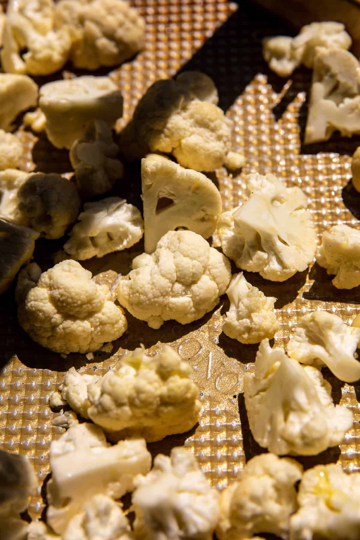 cauliflower on baking sheet before roasting 