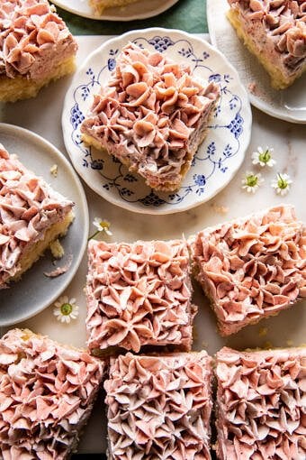 overhead photo of lemon cake cute into square pieces