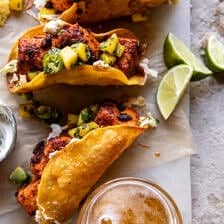Crispy BBQ Salmon Tacos with Avocado Mango Salsa and Jalapeno Cream | halfbakedharvest.com