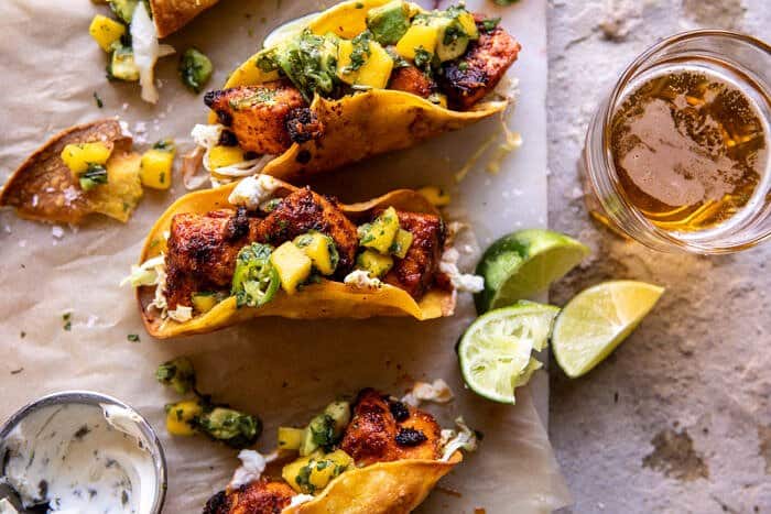 Crispy BBQ Salmon Tacos with Avocado Mango Salsa and Jalapeno Cream | halfbakedharvest.com
