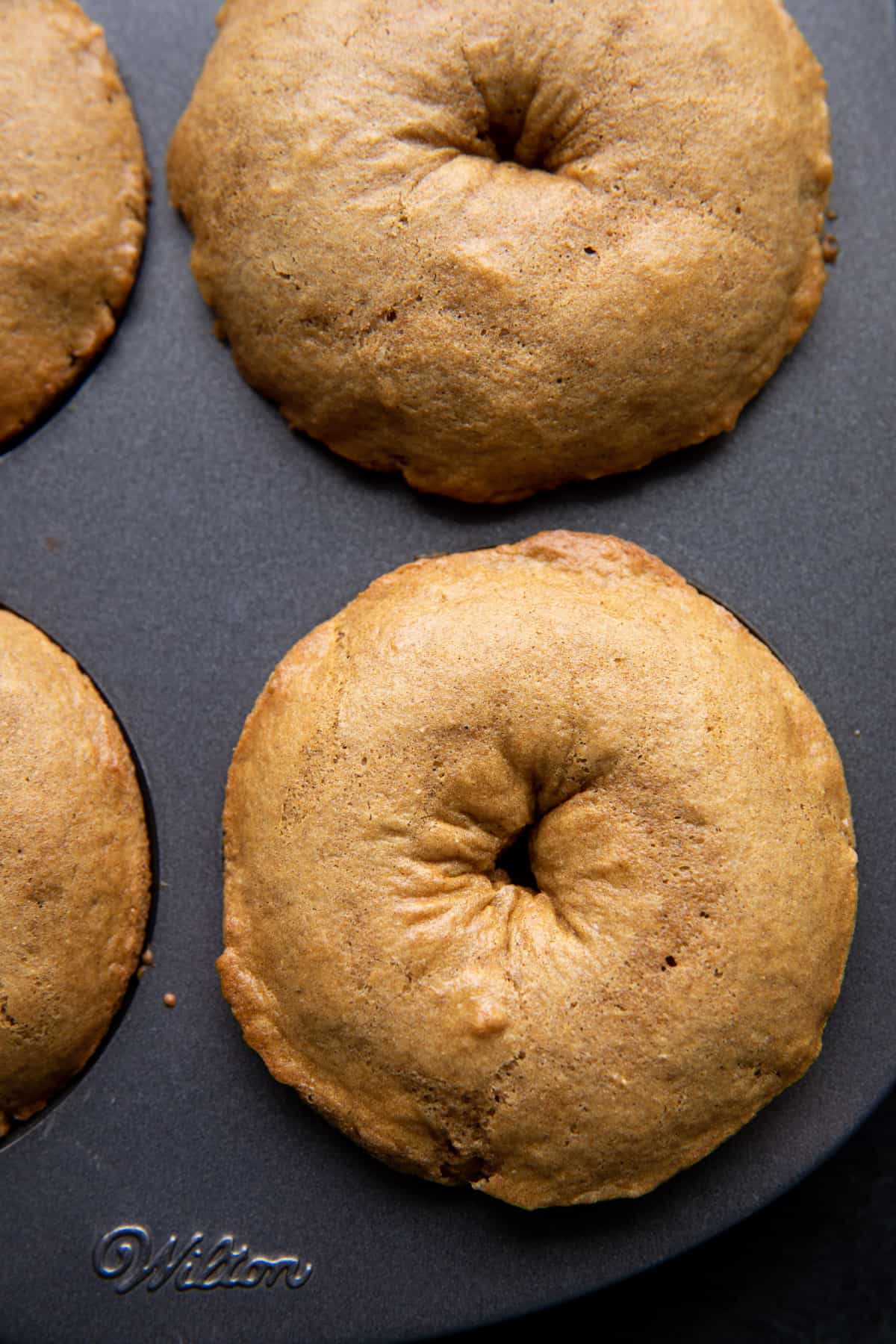 doughnut in doughnut pan after baking 