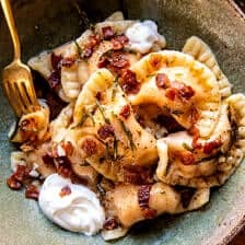 Sweet Potato Cheddar Pierogi with Bacon Bits | halfbakedharvest.com