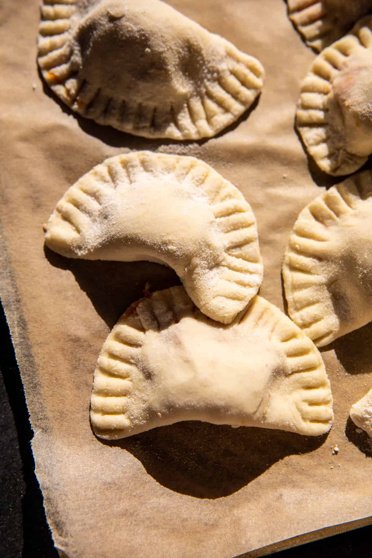 Sweet Potato Cheddar Pierogi with Bacon Bits | halfbakedharvest.com