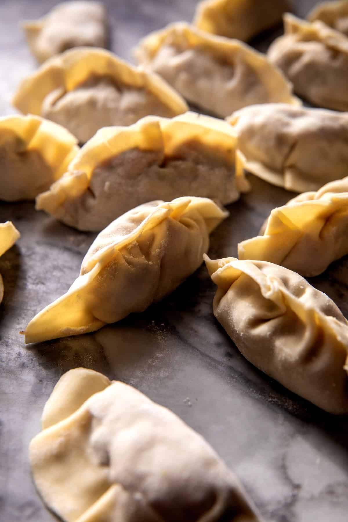 20 Minute Potstickers in Red Curry Garlic Broth | halfbakedharvest.com