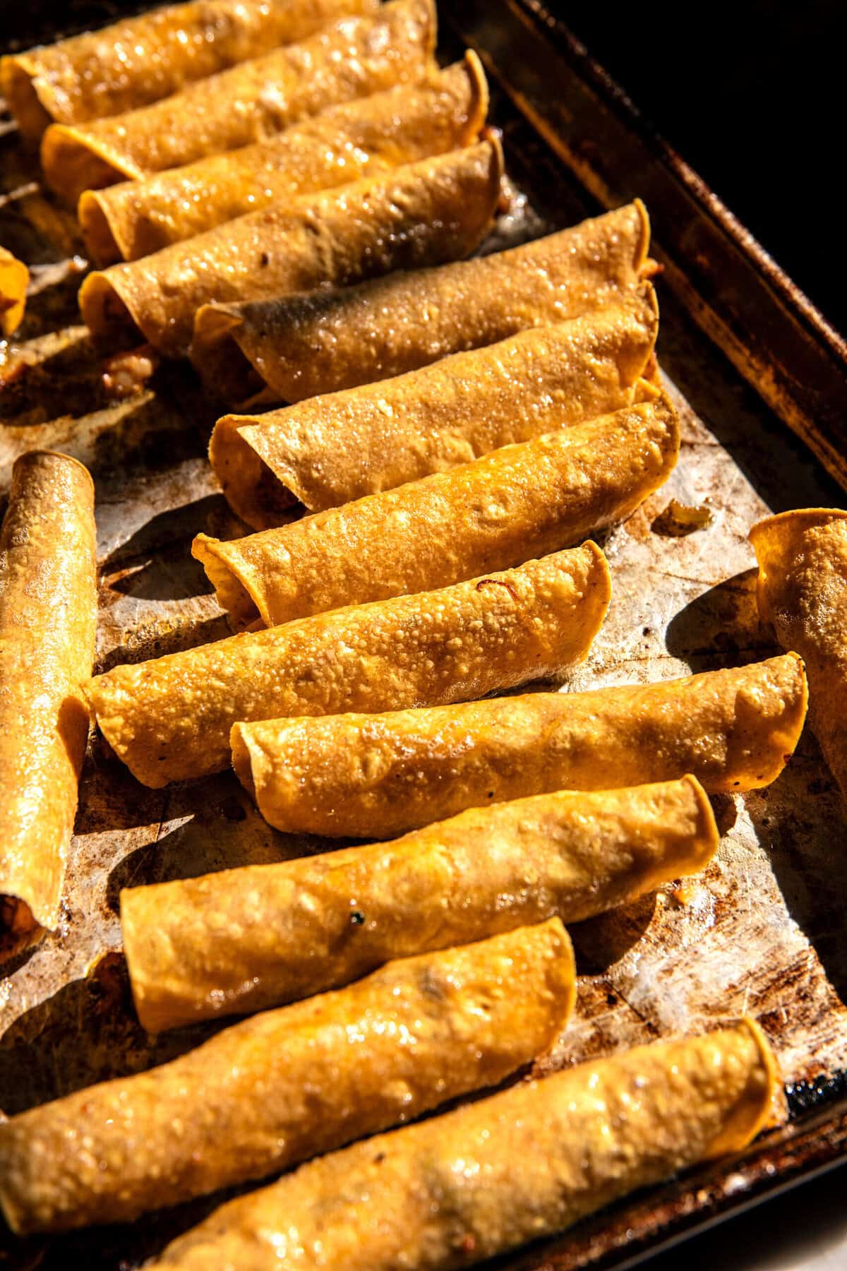 Baked Cheesy Cuban Chicken Taquitos | halfbakedharvest.com