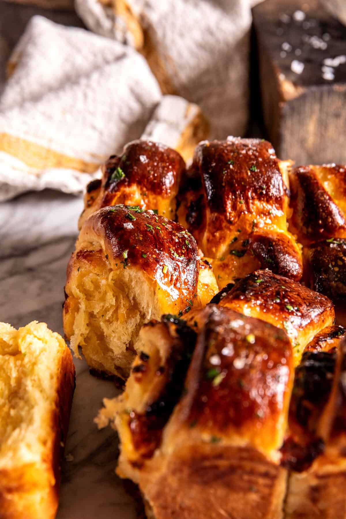 Salted Honey Butter Cheddar Brioche Rolls | halfbakedharvest.com